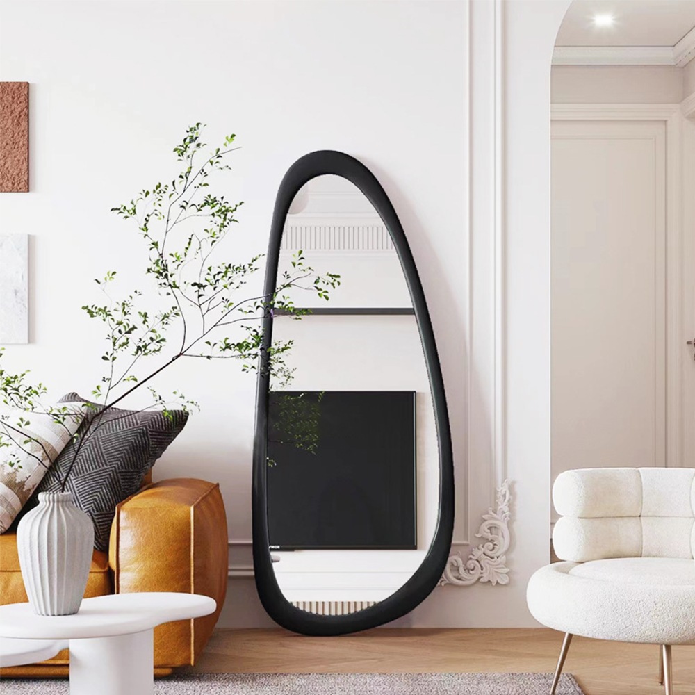 Irregular decorative wood mirror showing how frame shape affects packed dimensions